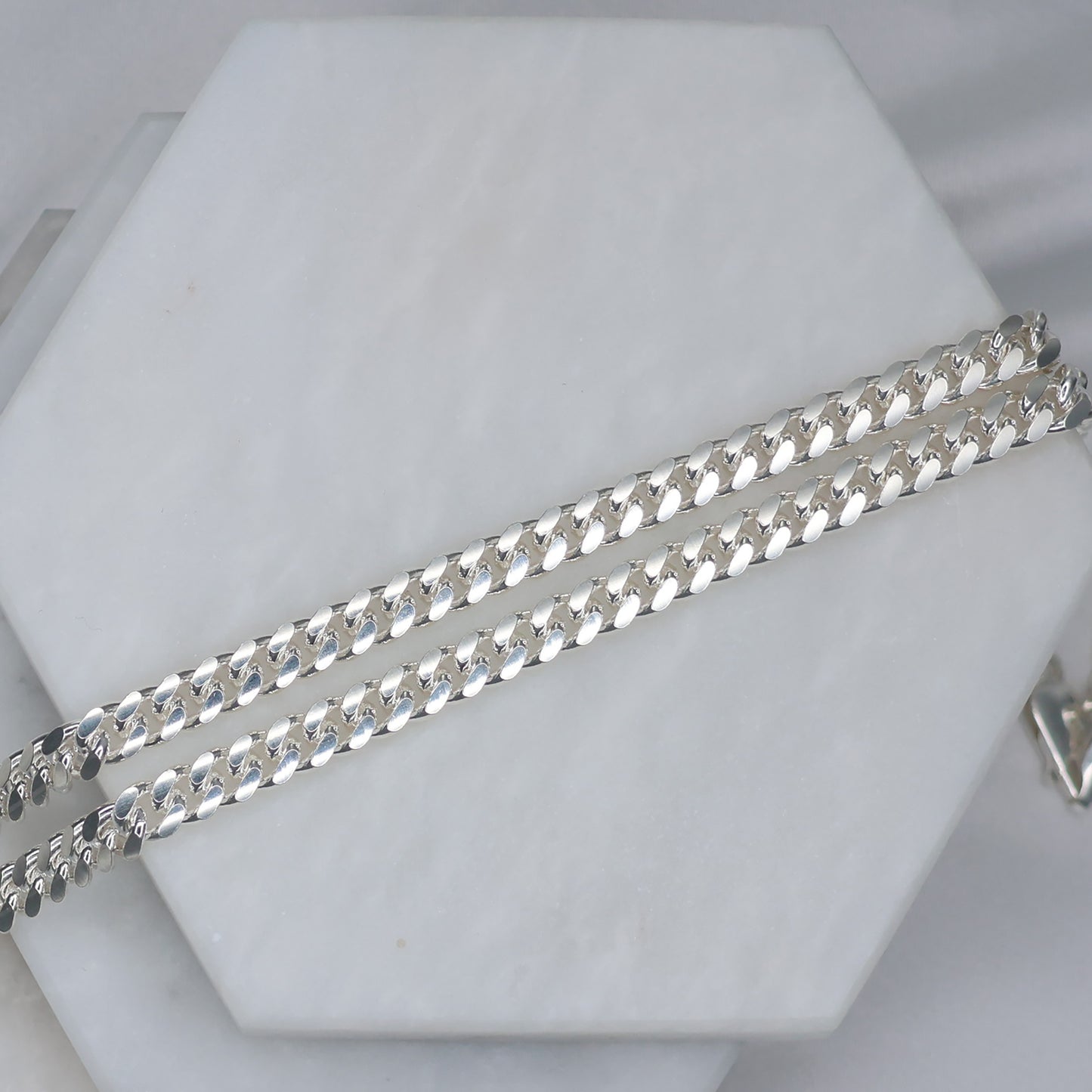 22 inch silver curb chain with a sleek and polished design for everyday wear