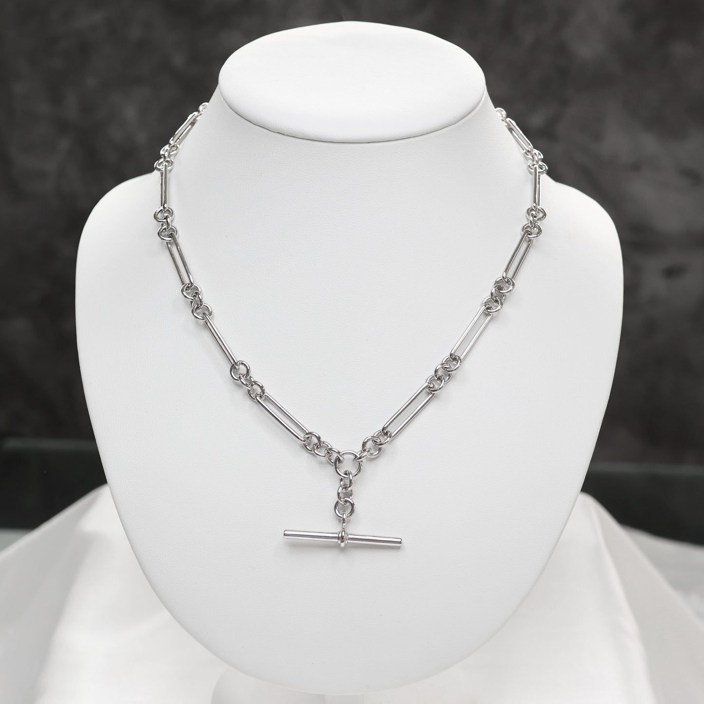Silver Albert chain with T-Bar modern vintage design on a display bust