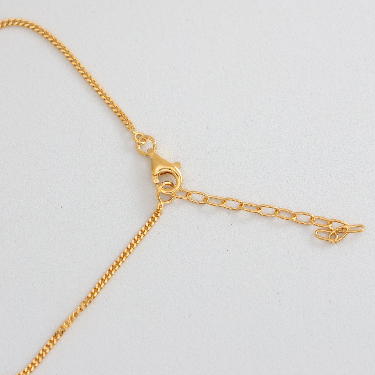 Buy gold bracelet with malachite featuring a sleek chain and lobster clasp for secure wear