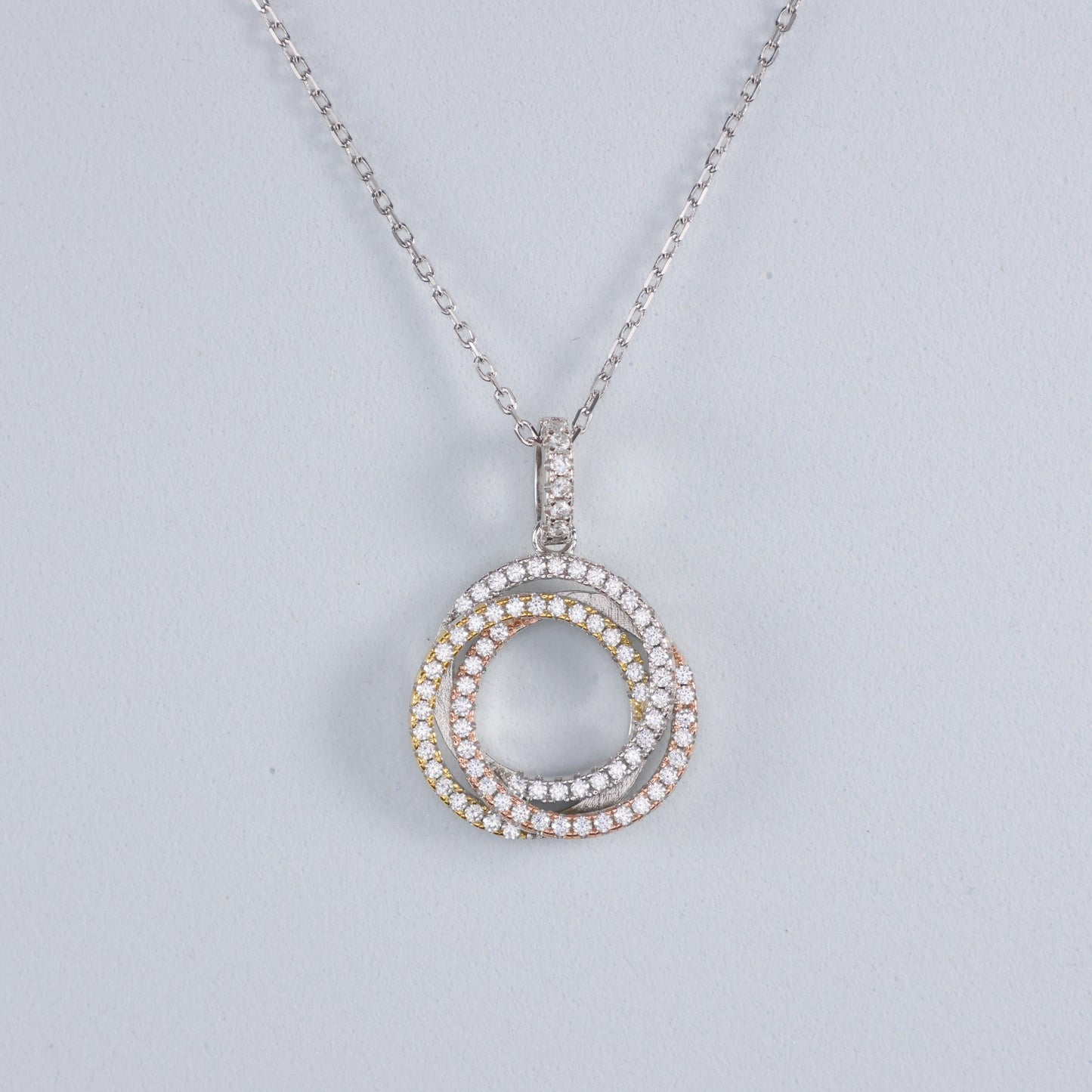Elegant Eternal Trinity Necklace with Cubic Zirconia featuring a looped design and shimmering stones