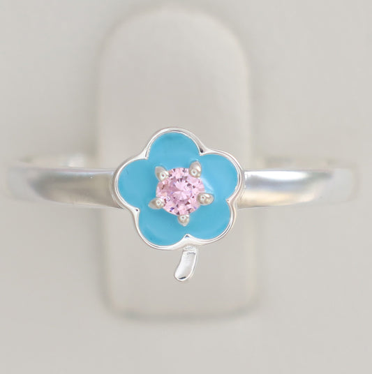 Floral design silver ring with a blue flower and pink gemstone center for a delicate touch
