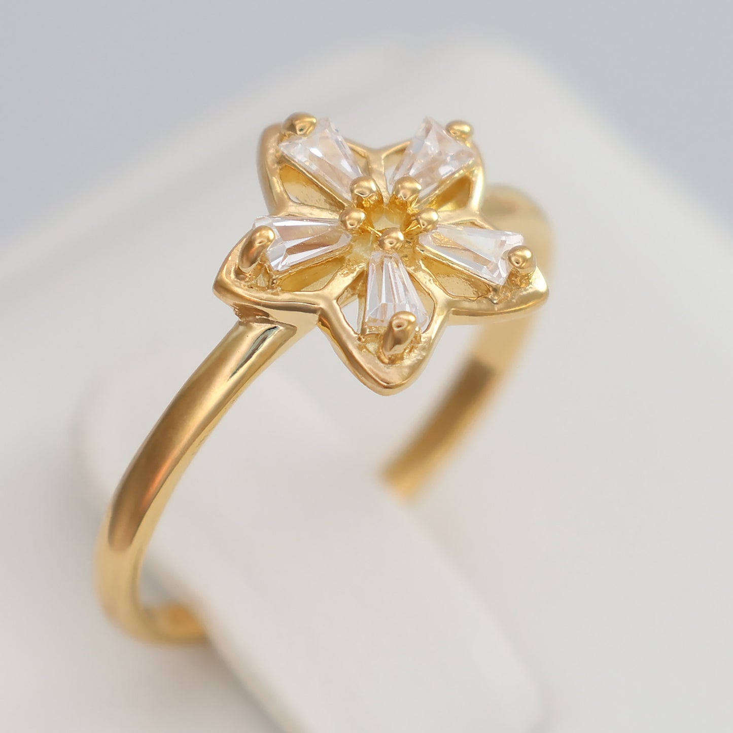 Flower design gold plated ring with sparkling accents for elegant jewelry lovers
