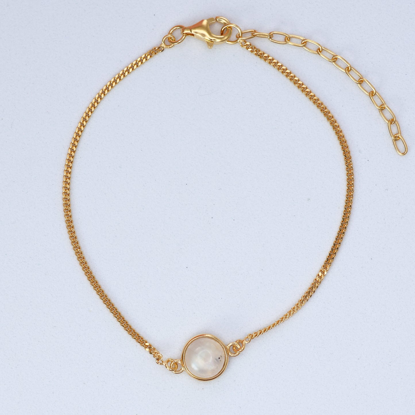 Gold Moonstone Bracelet featuring a simple chain design with a beautiful moonstone centerpiece