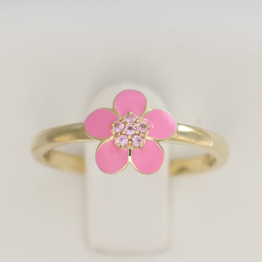 Gold plated pink enamel ring featuring a floral design with sparkling details