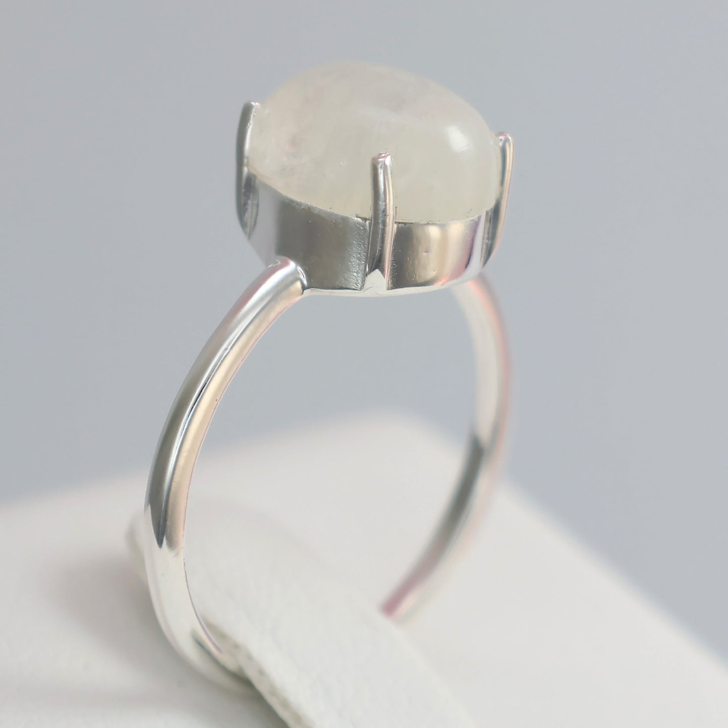 Large moonstone silver ring with a sleek design and polished finish for elegant styling