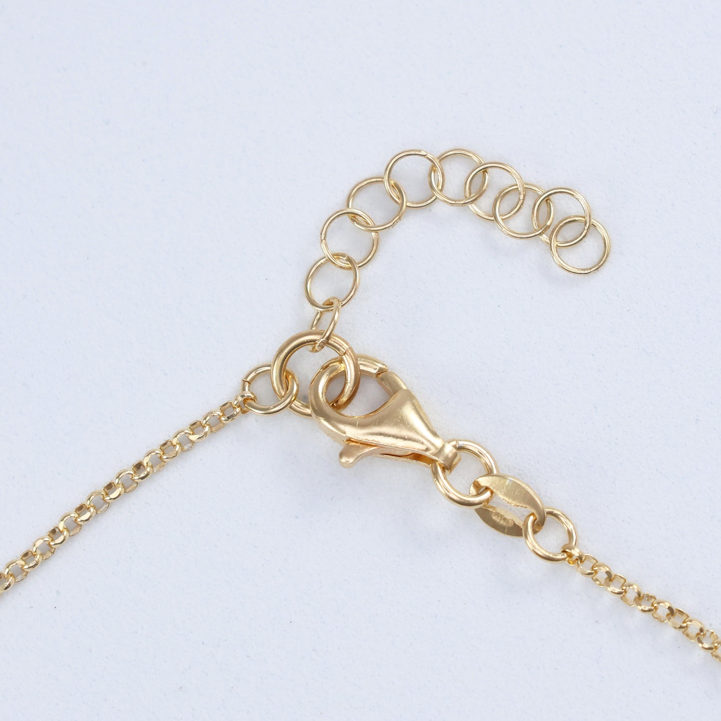 Gold clasp detail of a chain for the large ring hoop halo pendant from thejewelleryshop.co.uk