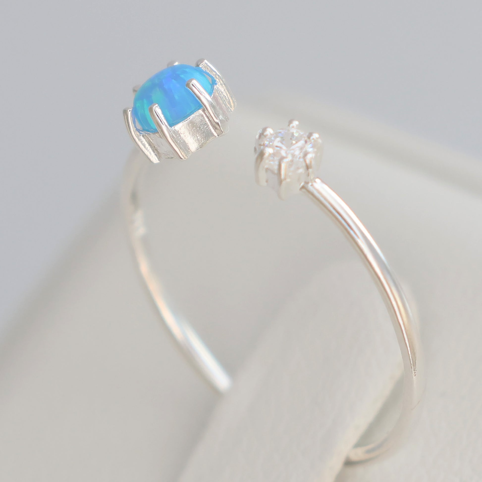 Delicate Opalite silver ring featuring a stunning blue opalite stone set in a sleek design