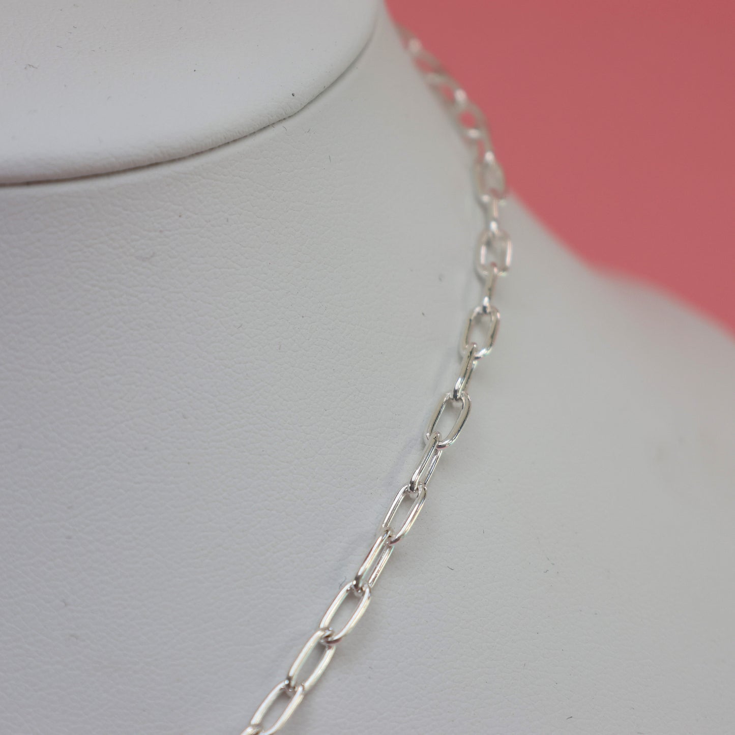 Elegant padlock clasp silver necklace showcasing a delicate chain design for everyday wear