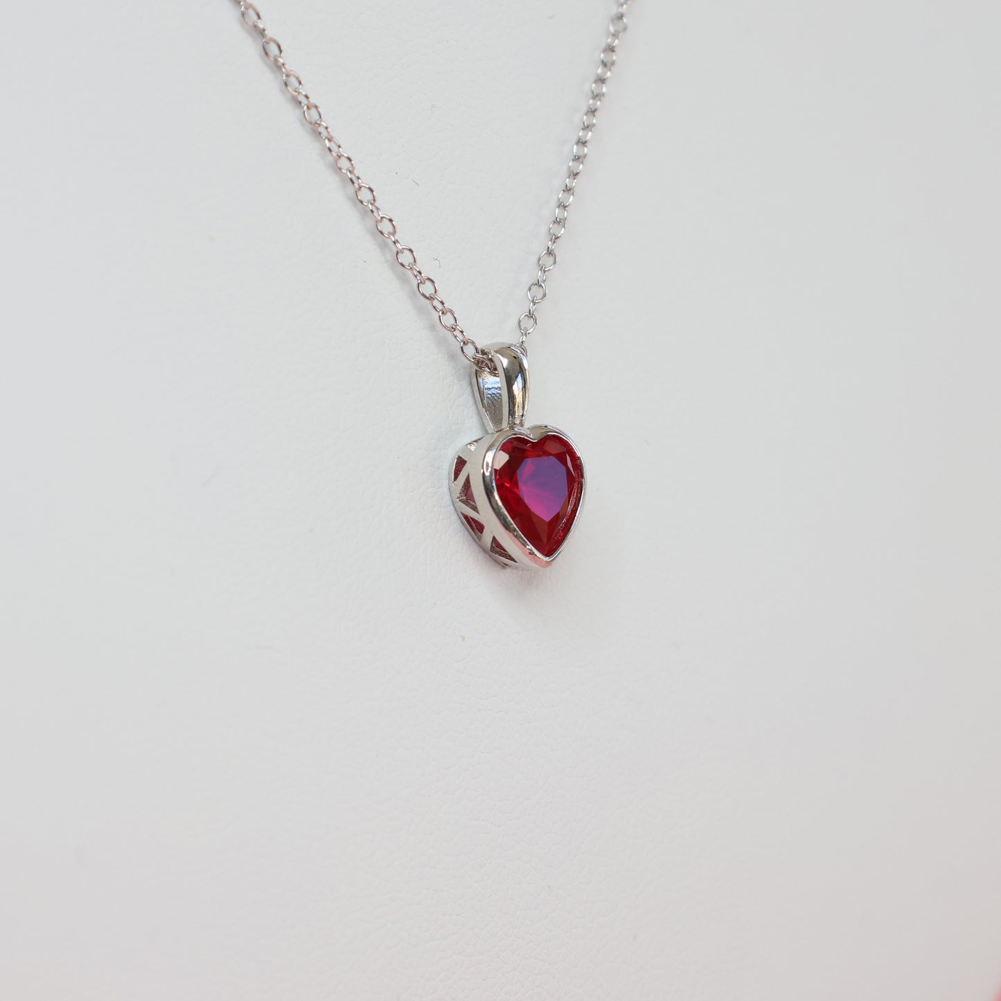 Red heart cubic zirconia pendant on a delicate silver chain, perfect for special occasions
