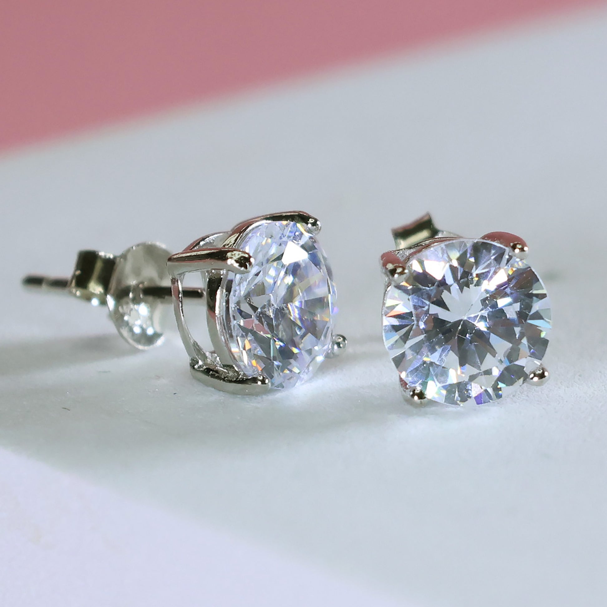 Round cubic zirconia silver studs 7mm in a classic design for elegant everyday wear