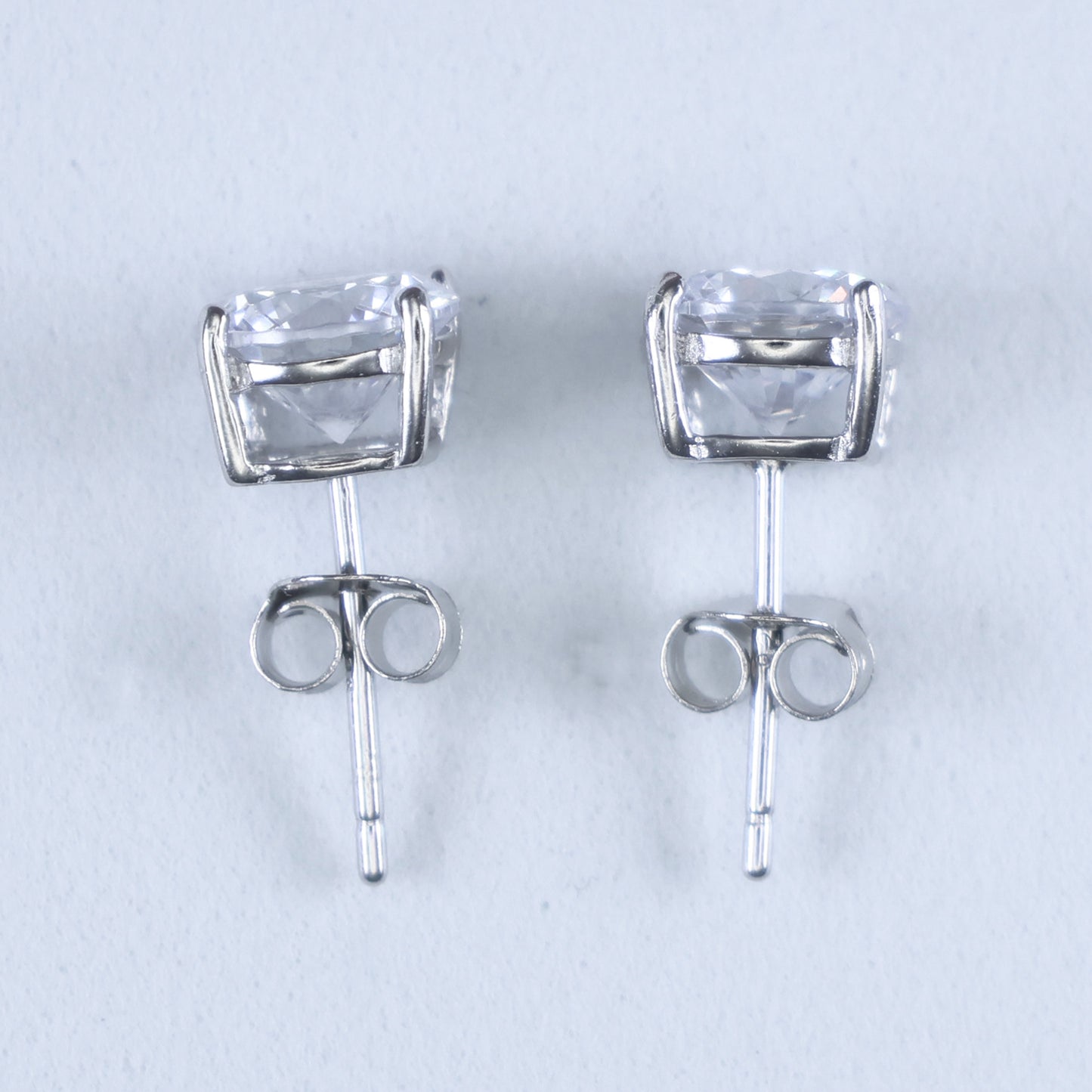 Elegant round cubic zirconia silver studs 7mm sparkling in a classic design for versatile wear