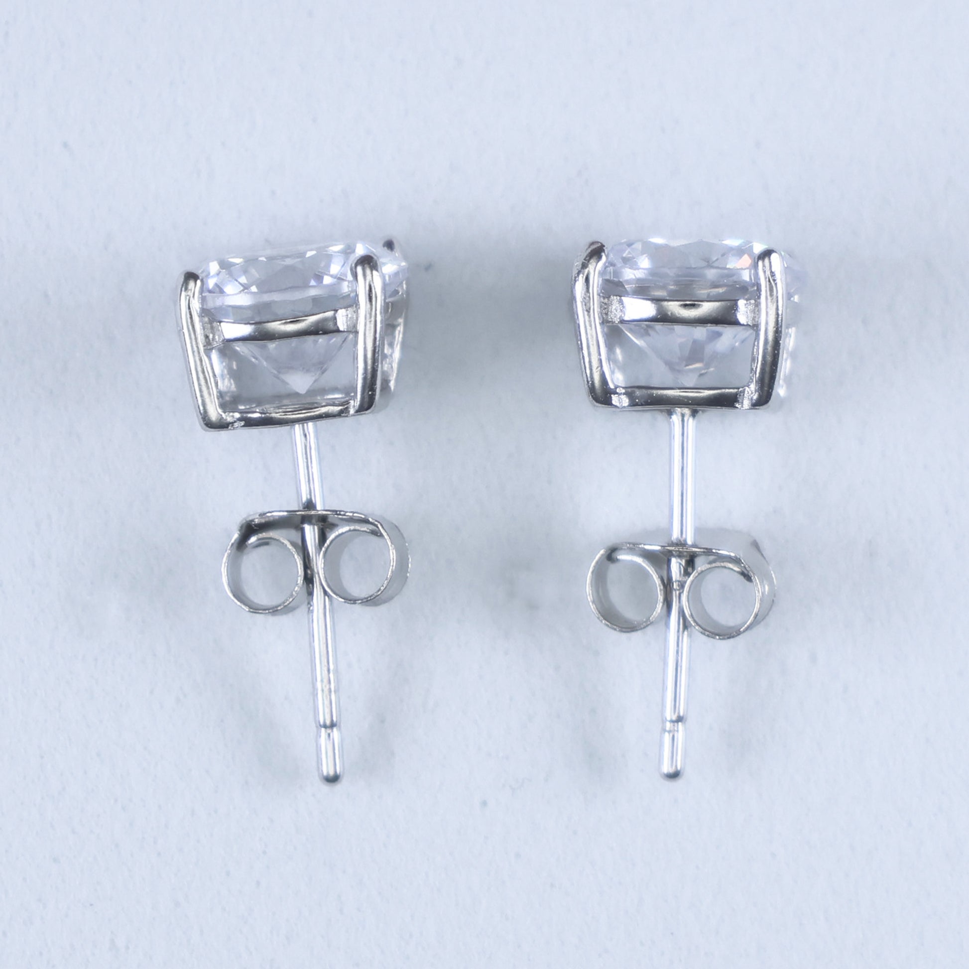 Elegant round cubic zirconia silver studs 7mm sparkling in a classic design for versatile wear