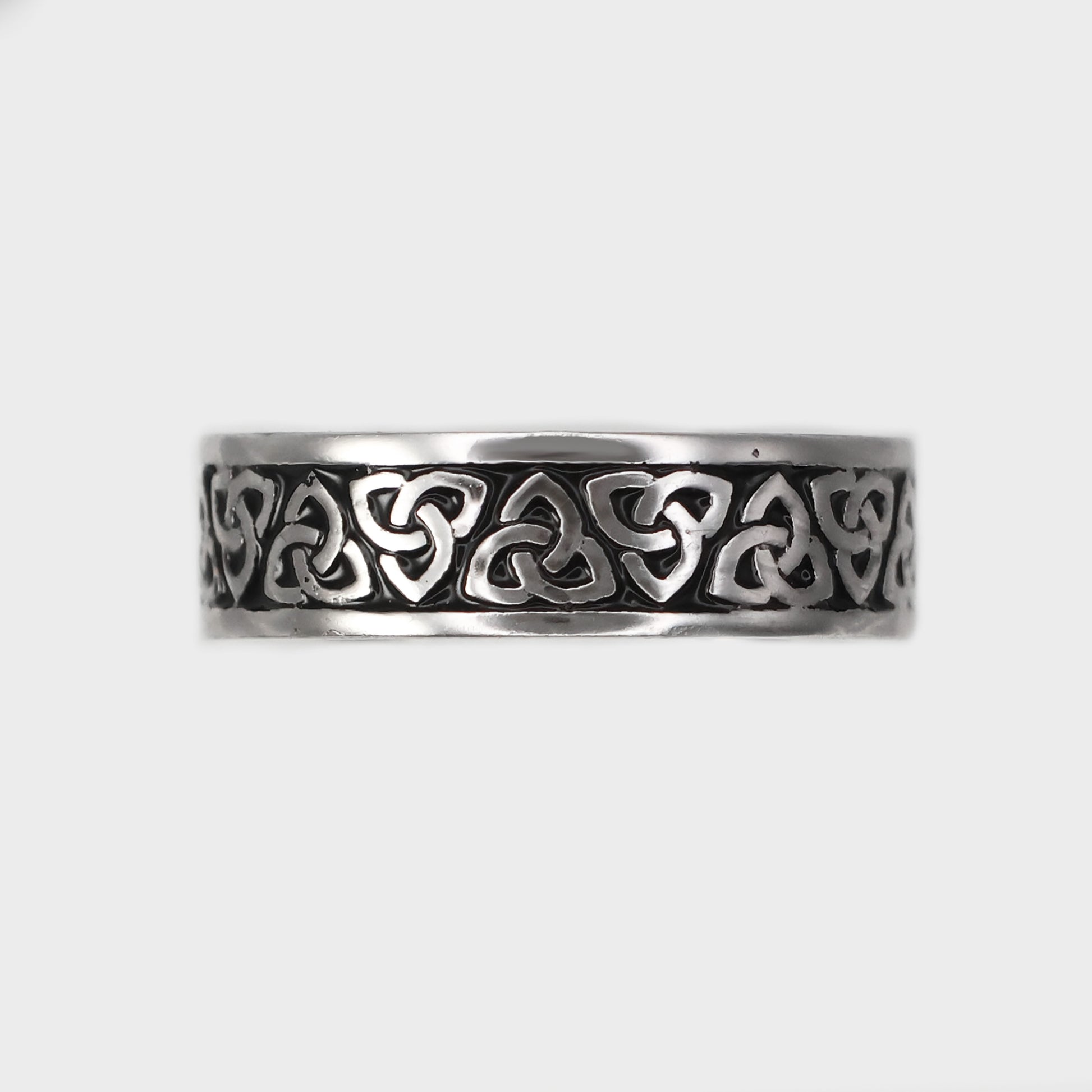 Elegant Silver Celtic band ring featuring intricate knotwork design for a timeless look
