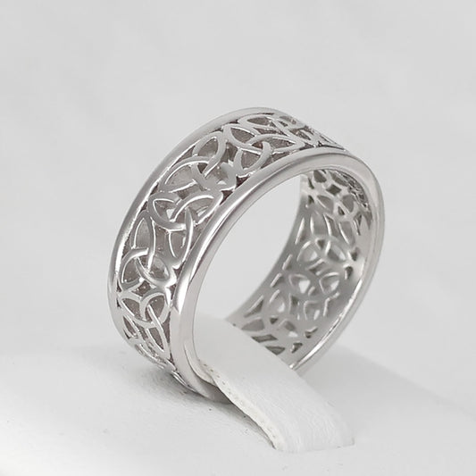 Stylish Silver Celtic band ring with intricate cut-out patterns for elegant jewelry lovers