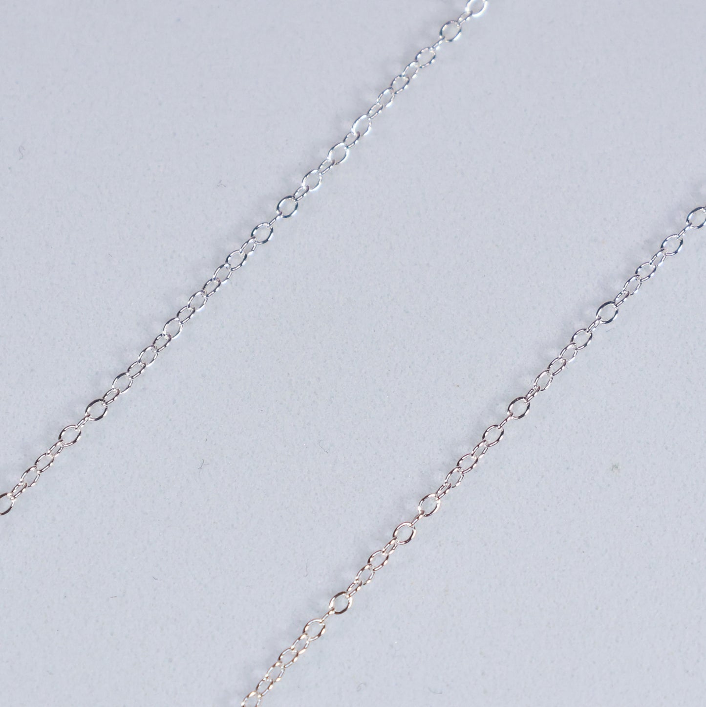 Delicate silver circle pendant necklace featuring an elegant chain design from thejewelleryshop.co.uk