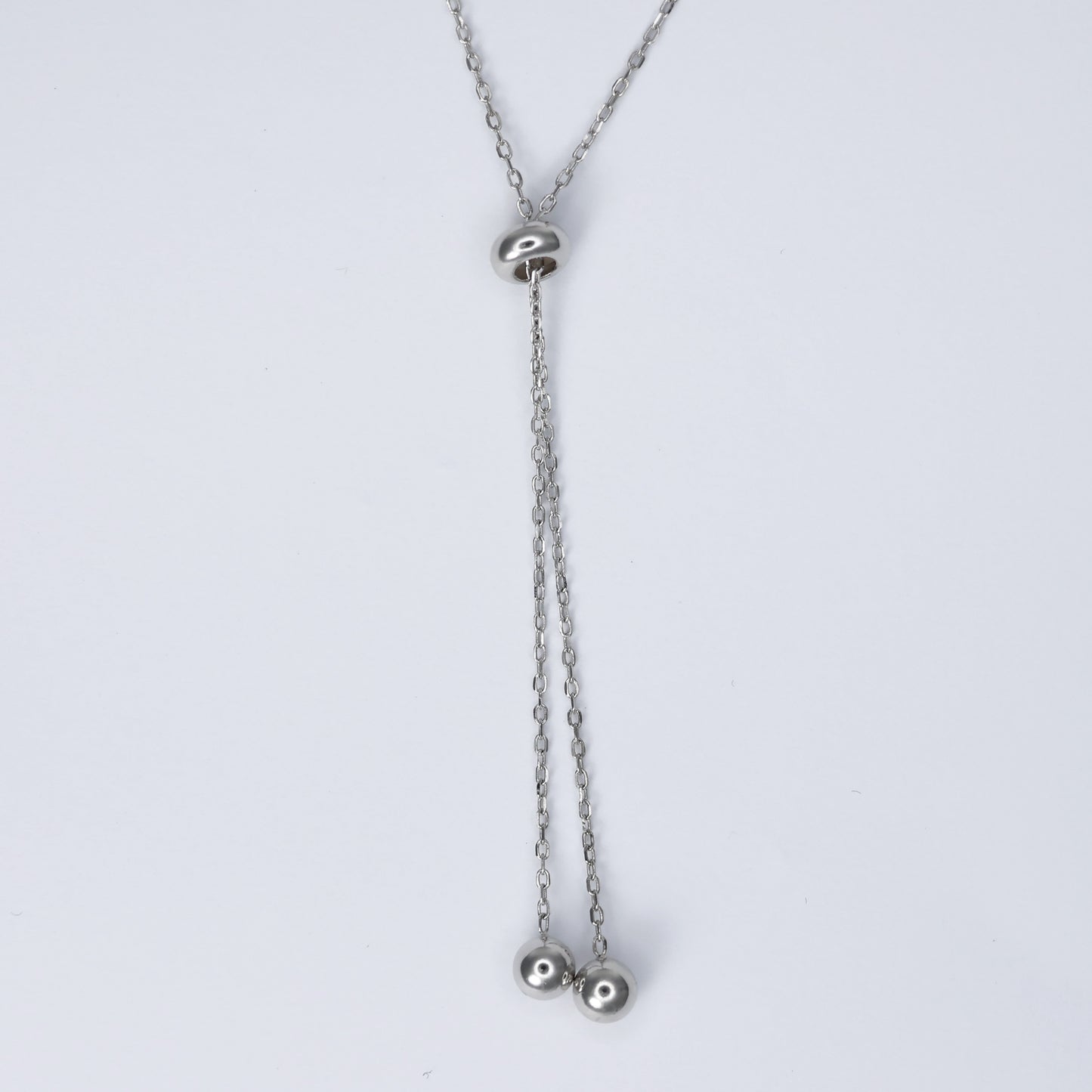 Elegant silver cross necklace for women featuring a delicate chain and stylish pendant design