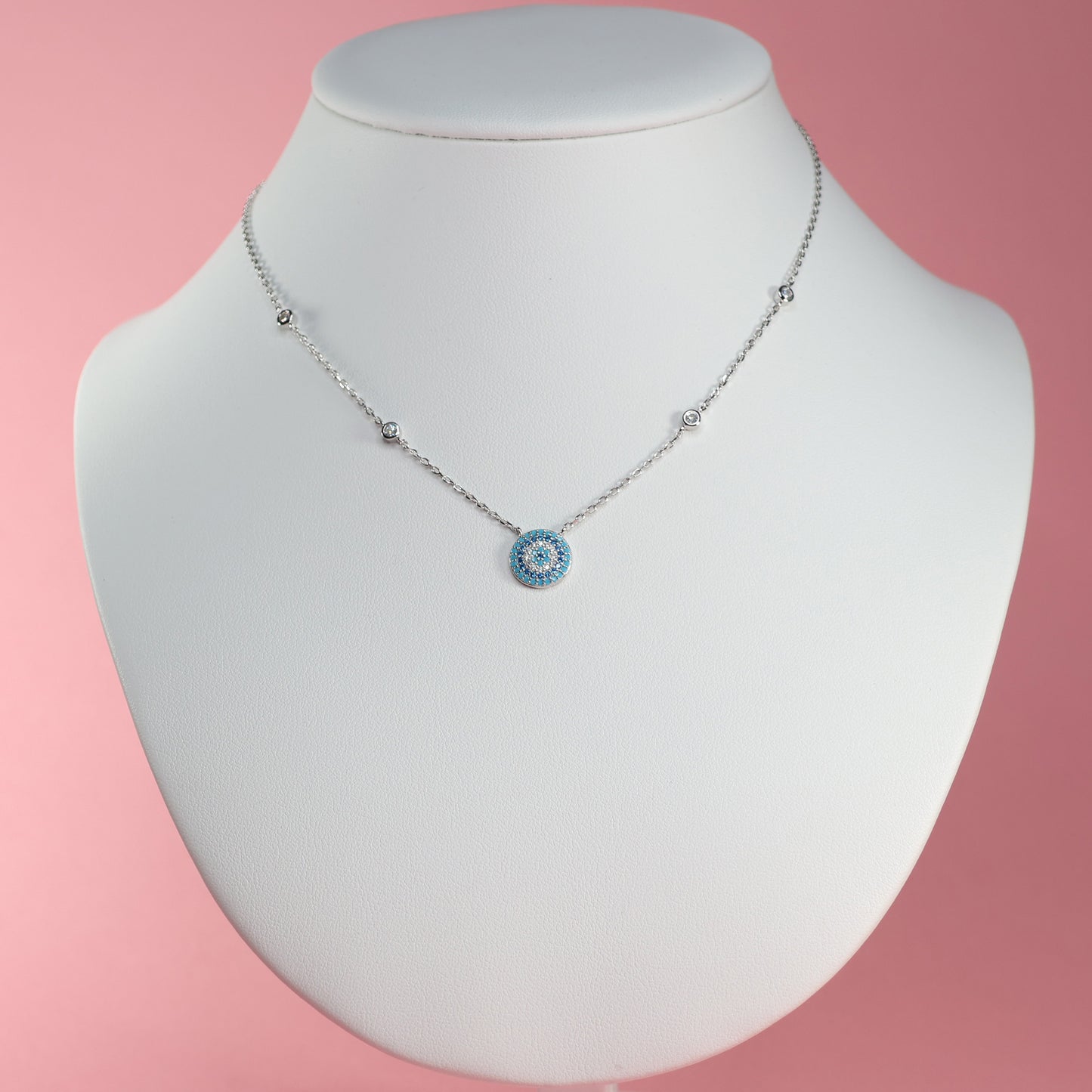 Elegant Silver Evil Eye Pendant Necklace with delicate chain design for stylish protection