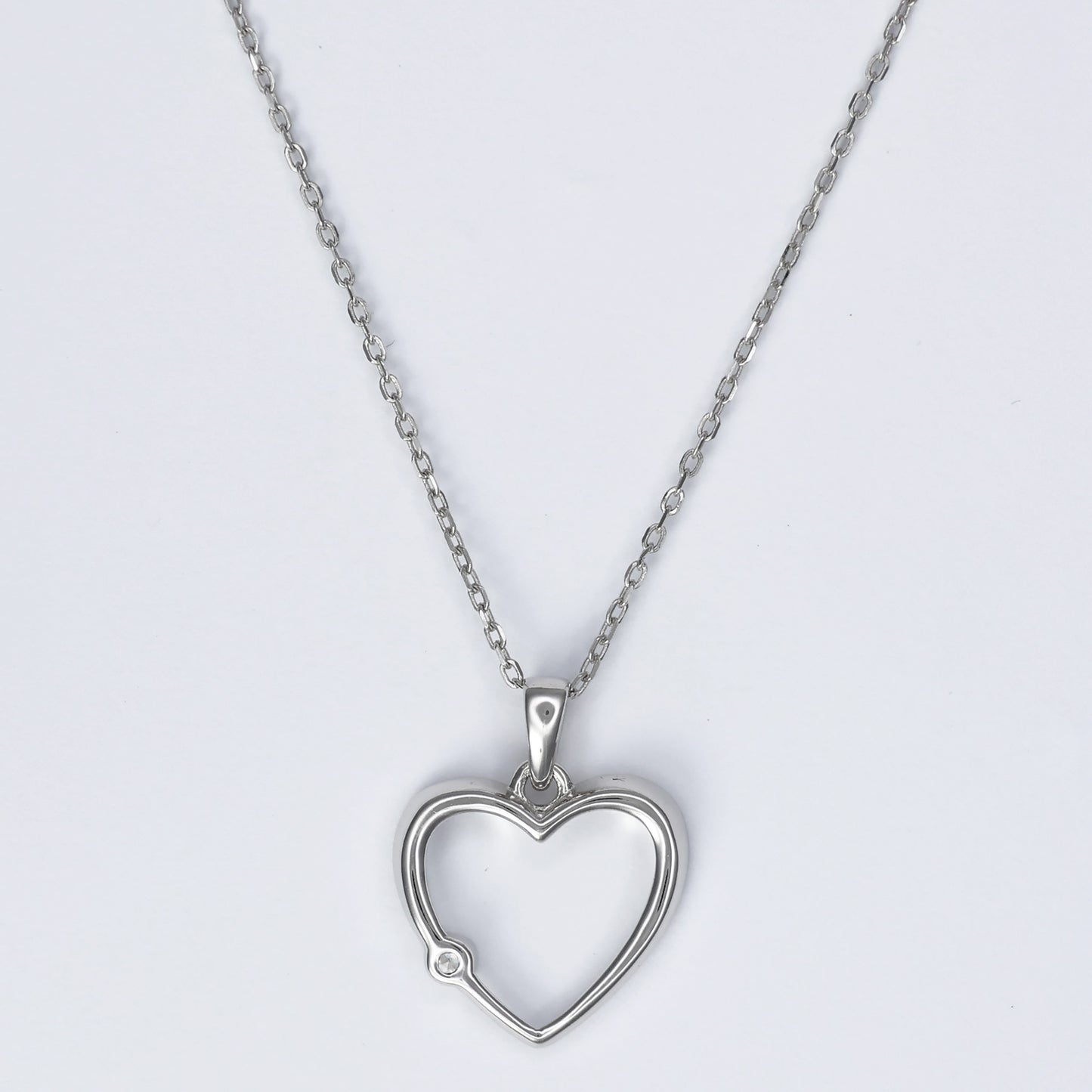 Elegant silver heart pendant for women with a delicate chain and minimalist design