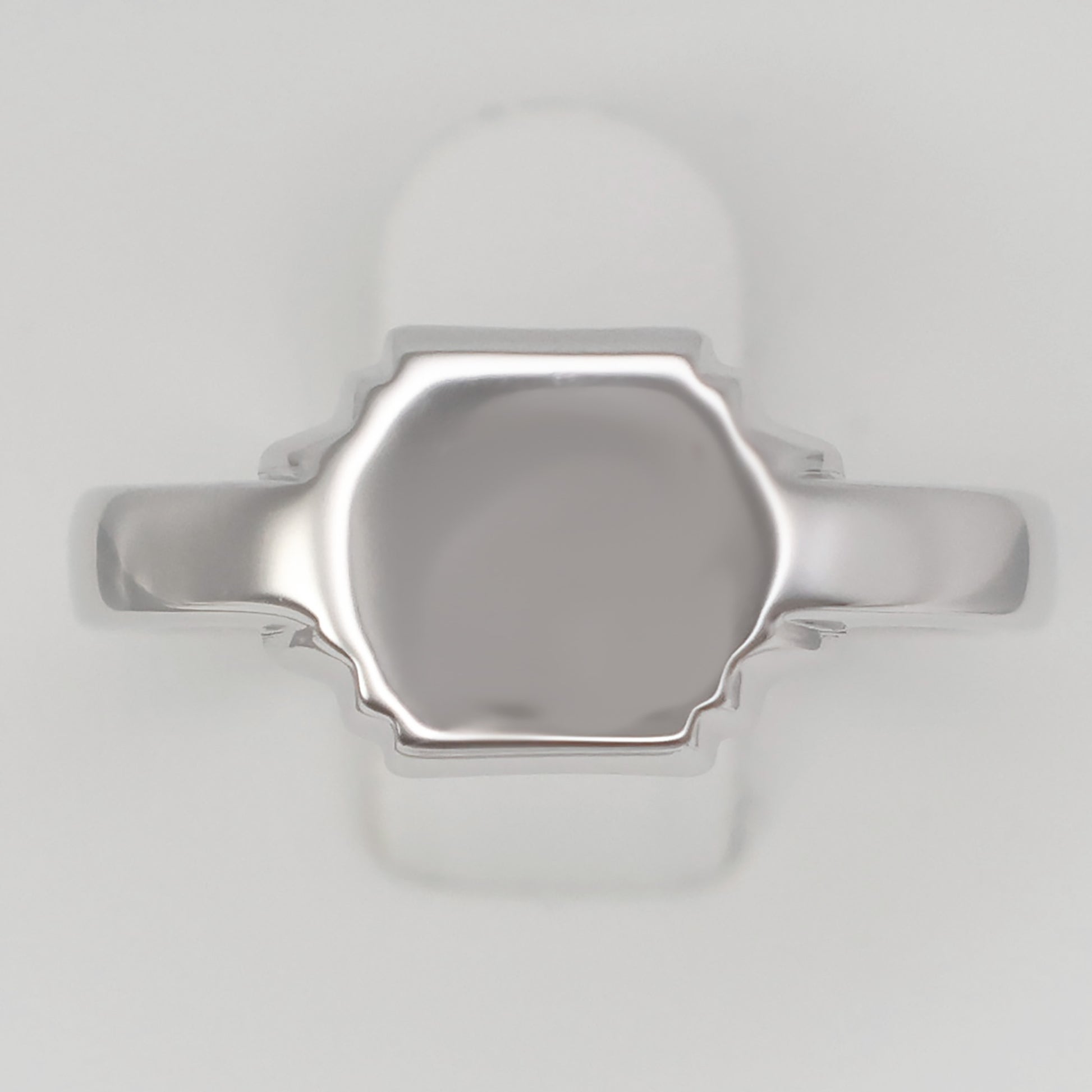 Elegant silver hexagon signet ring with a polished finish for a timeless look