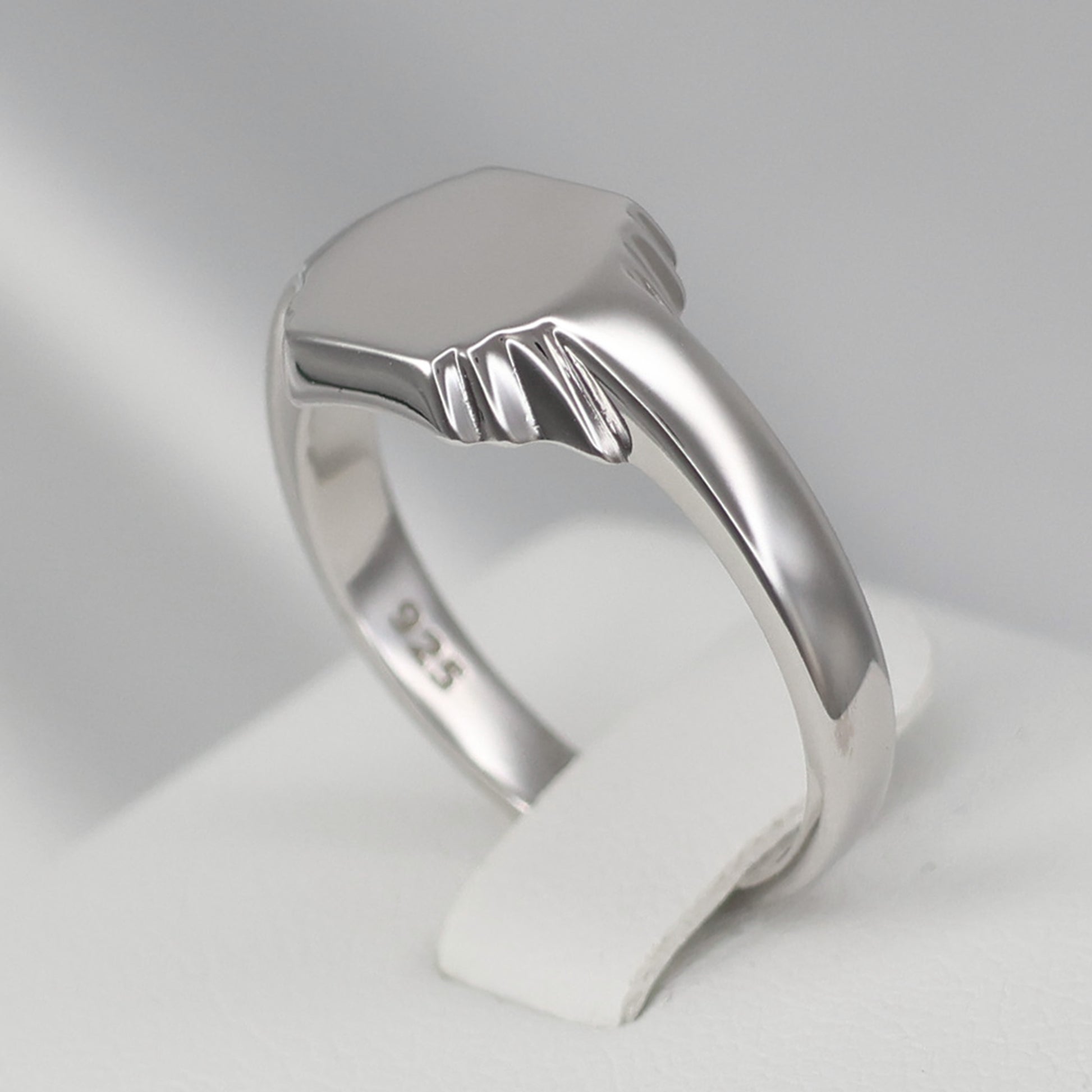 Stylish silver hexagon signet ring with a polished finish, perfect for everyday wear