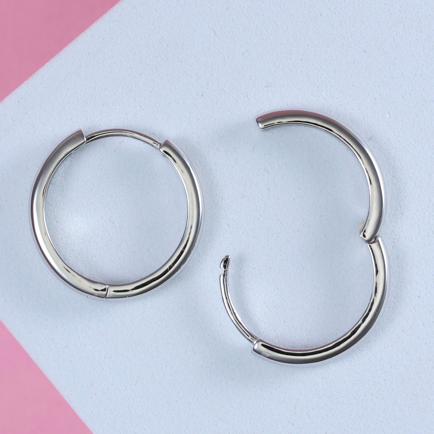 Sleek silver hoop earrings 20mm with a polished finish for everyday elegance