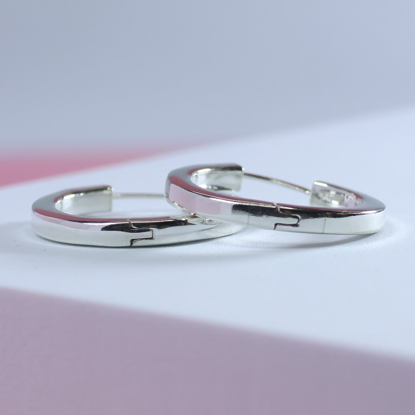 Elegant silver hoop earrings 25mm with a sleek design for everyday wear