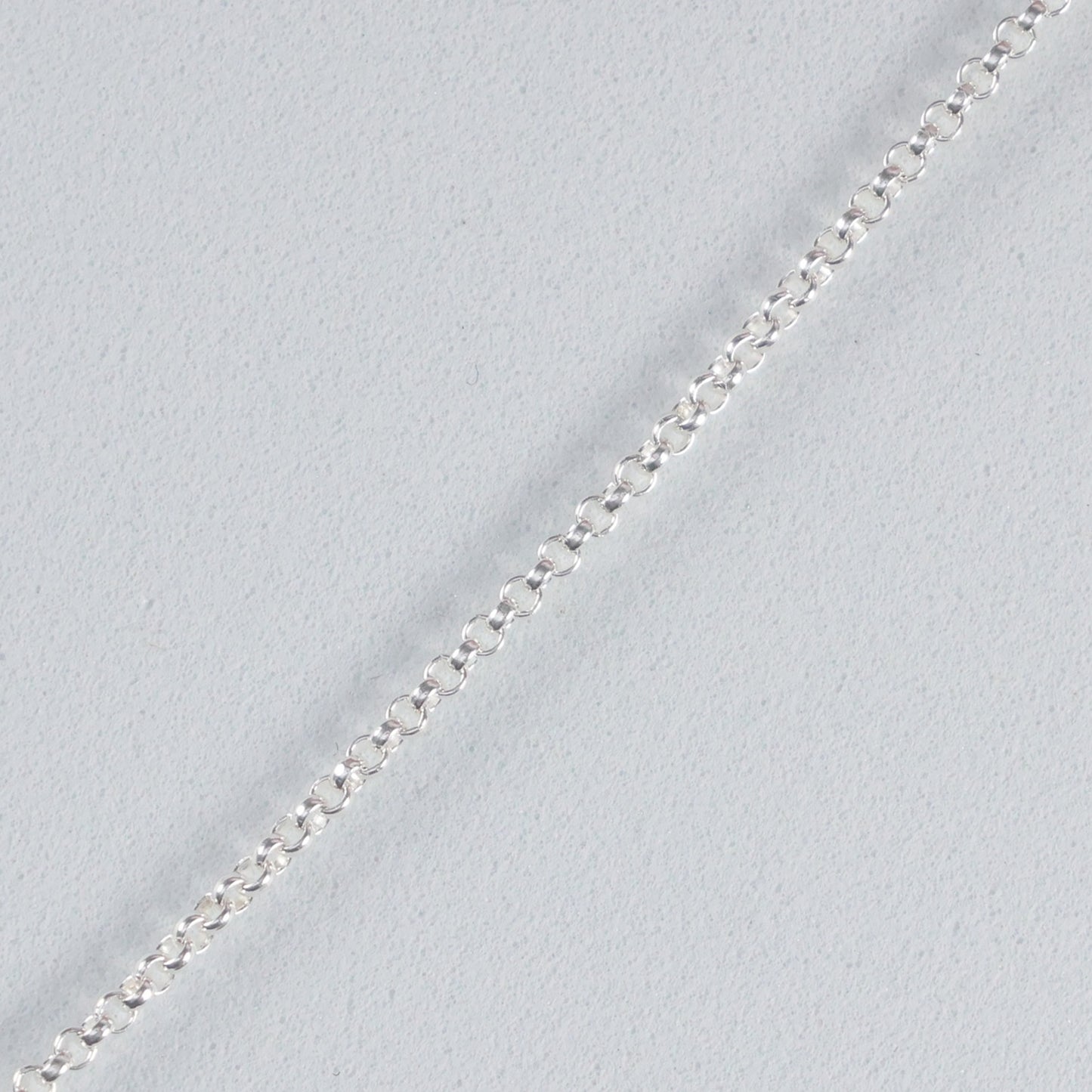 Silver interlocking hoop necklace featuring a delicate chain and elegant design for stylish layering