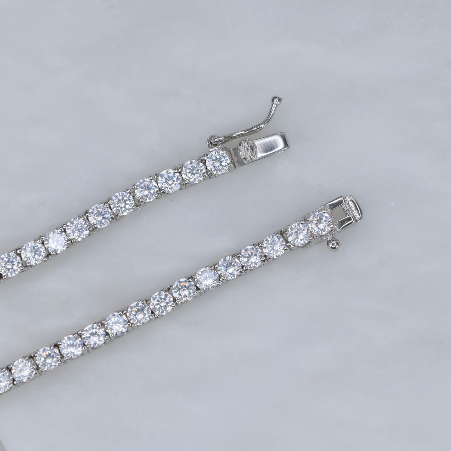 Elegant silver tennis necklace featuring sparkling cubic zirconia stones for a timeless look