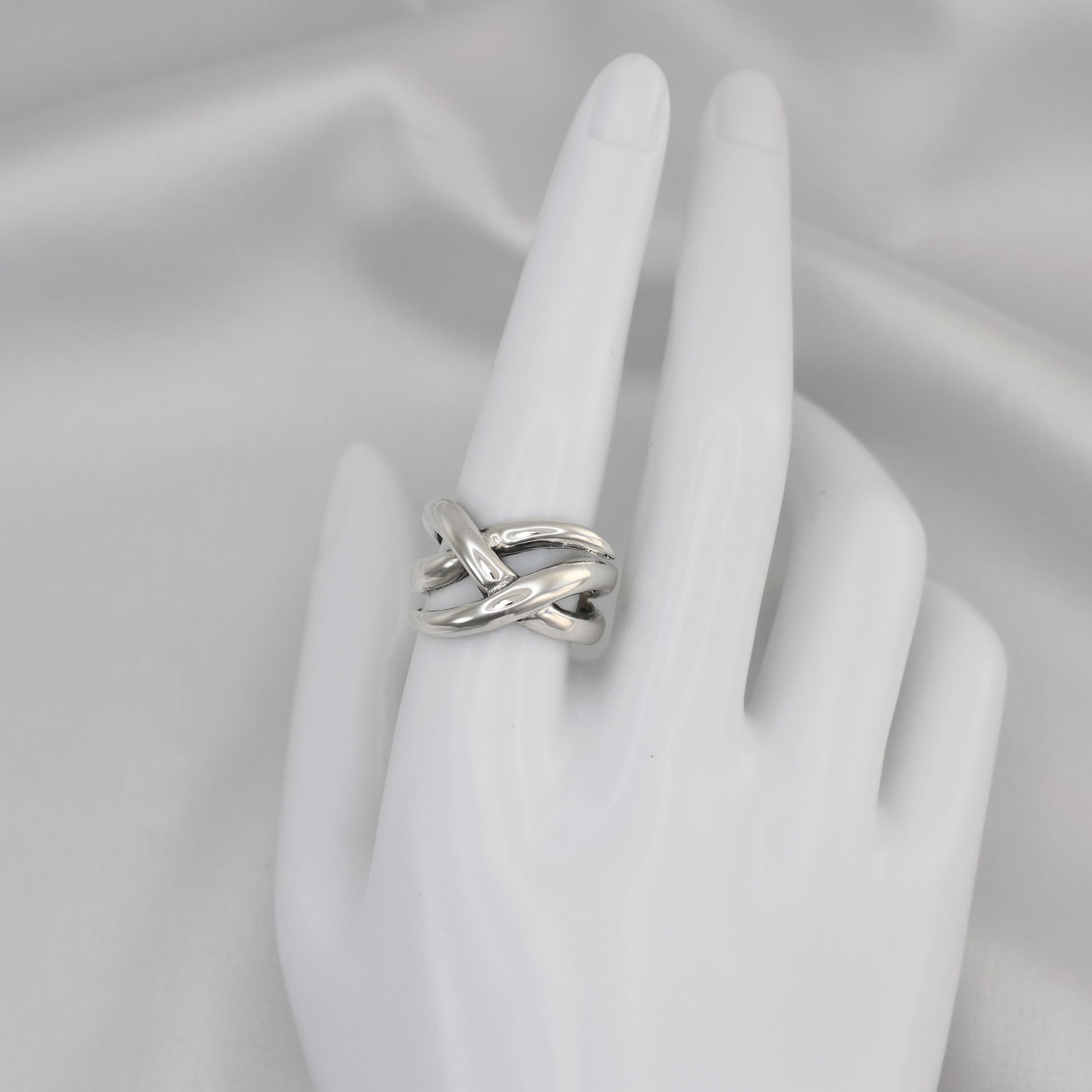 Silver Weave design ring size Q featuring a stylish intertwined pattern for elegant wear