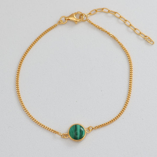 Elegant gold bracelet with malachite gemstone centerpiece from the Jewellery Shop