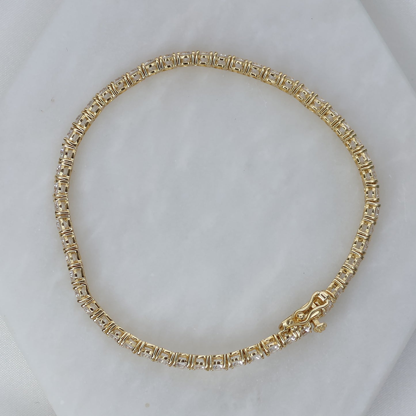Elegant gold plated tennis bracelet with a classic design for everyday wear