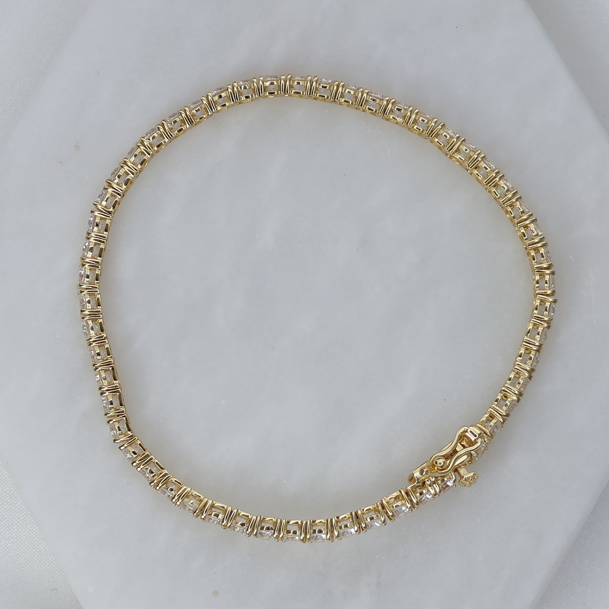 Elegant gold plated tennis bracelet with a classic design for everyday wear