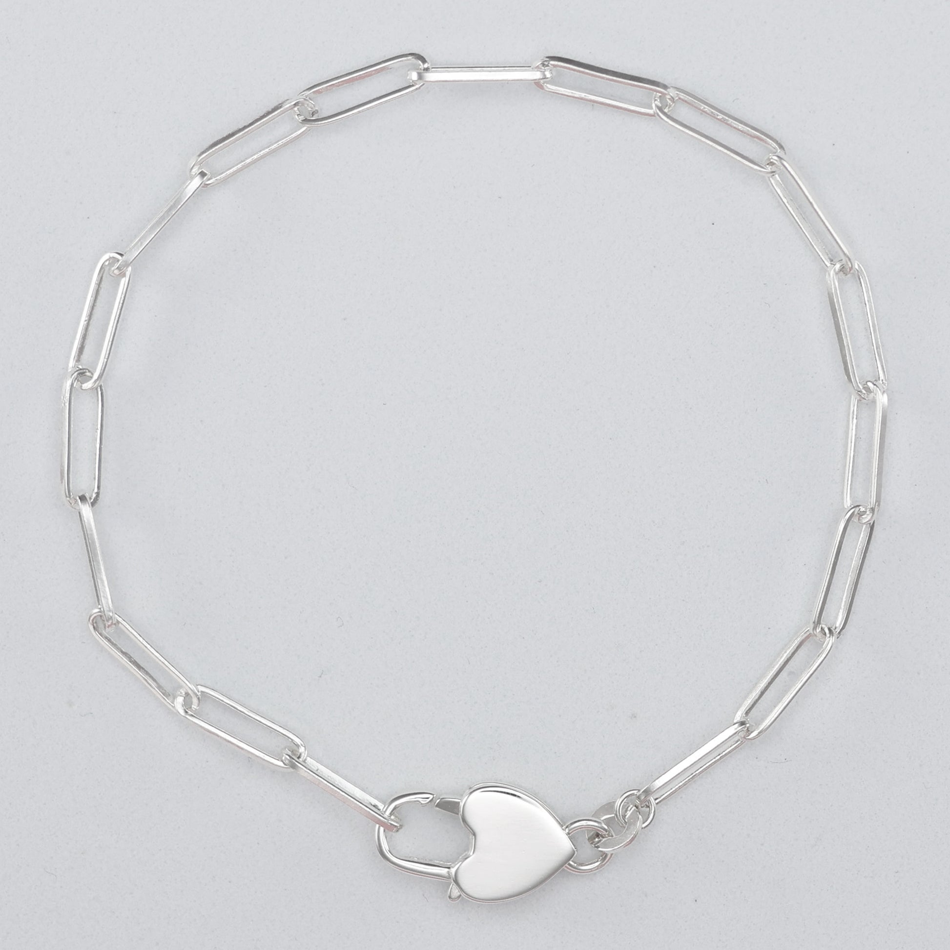 Stylish heart clasp silver bracelet with a delicate chain design, perfect for everyday wear