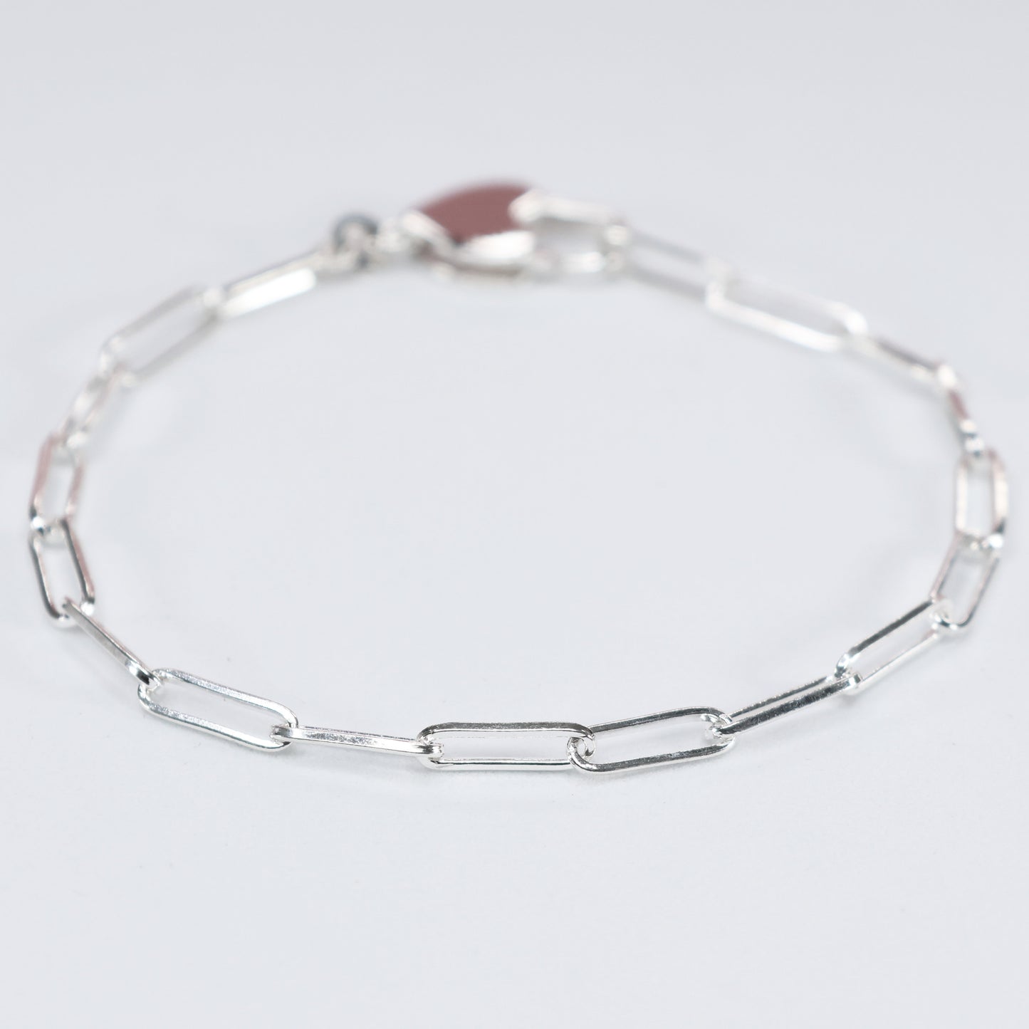 Stylish heart clasp silver bracelet with a delicate chain design for a modern look