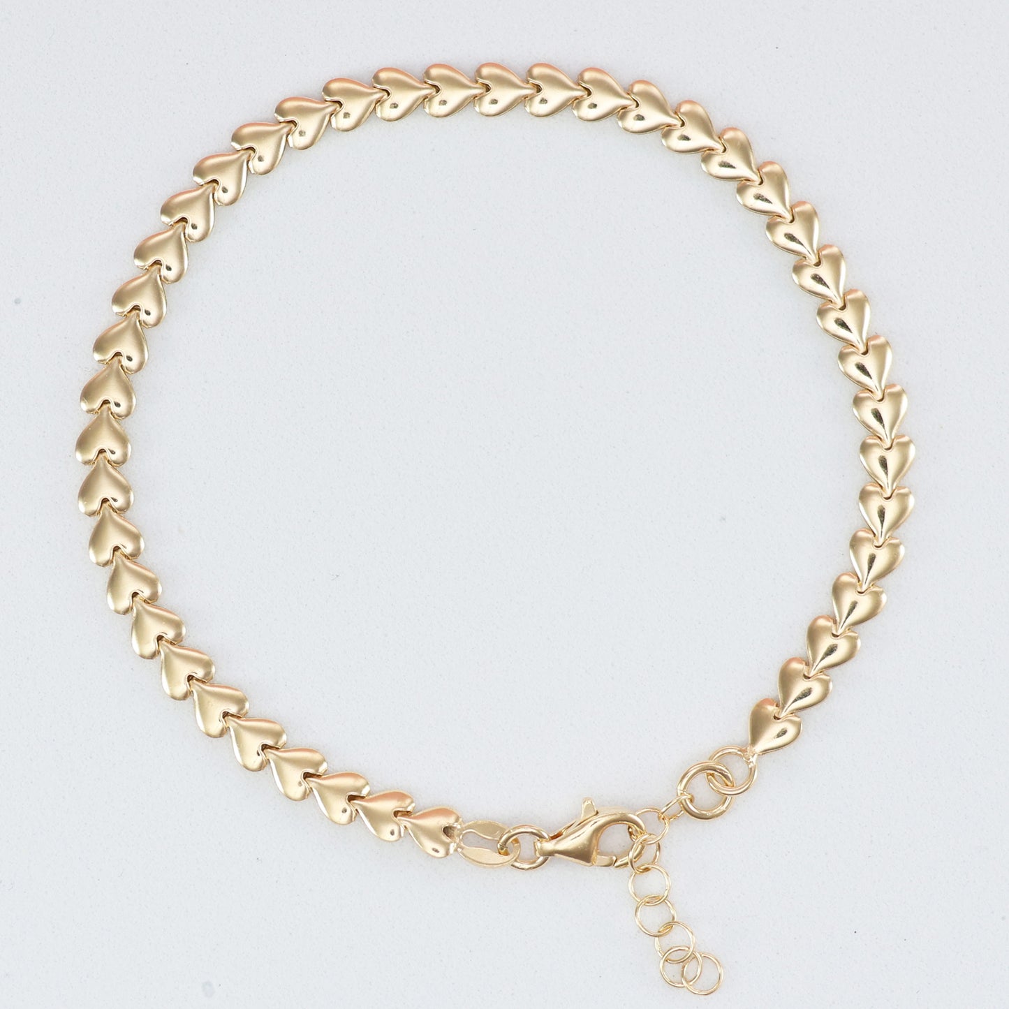Stylish gold heart link bracelet for her with a unique heart design and adjustable clasp