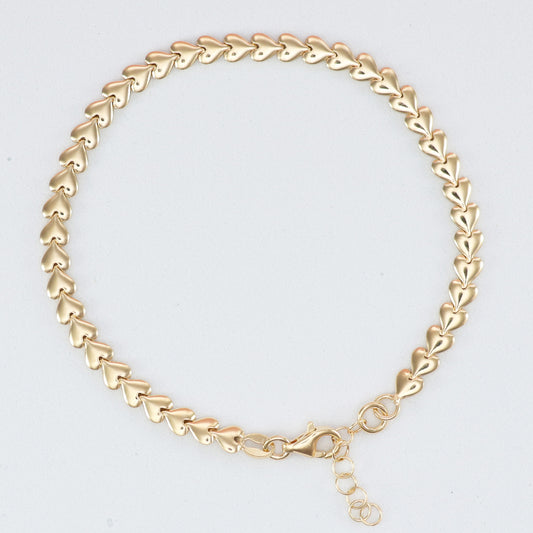 Stylish gold heart link bracelet for her with a unique heart design and adjustable clasp
