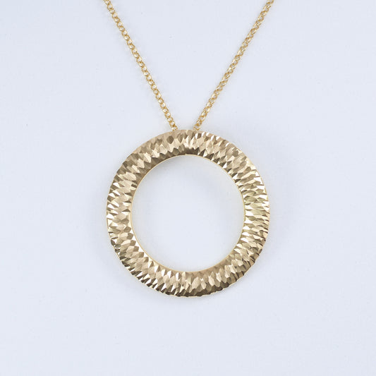 Large ring hoop halo pendant in textured gold with a polished finish, perfect for stylish outfits
