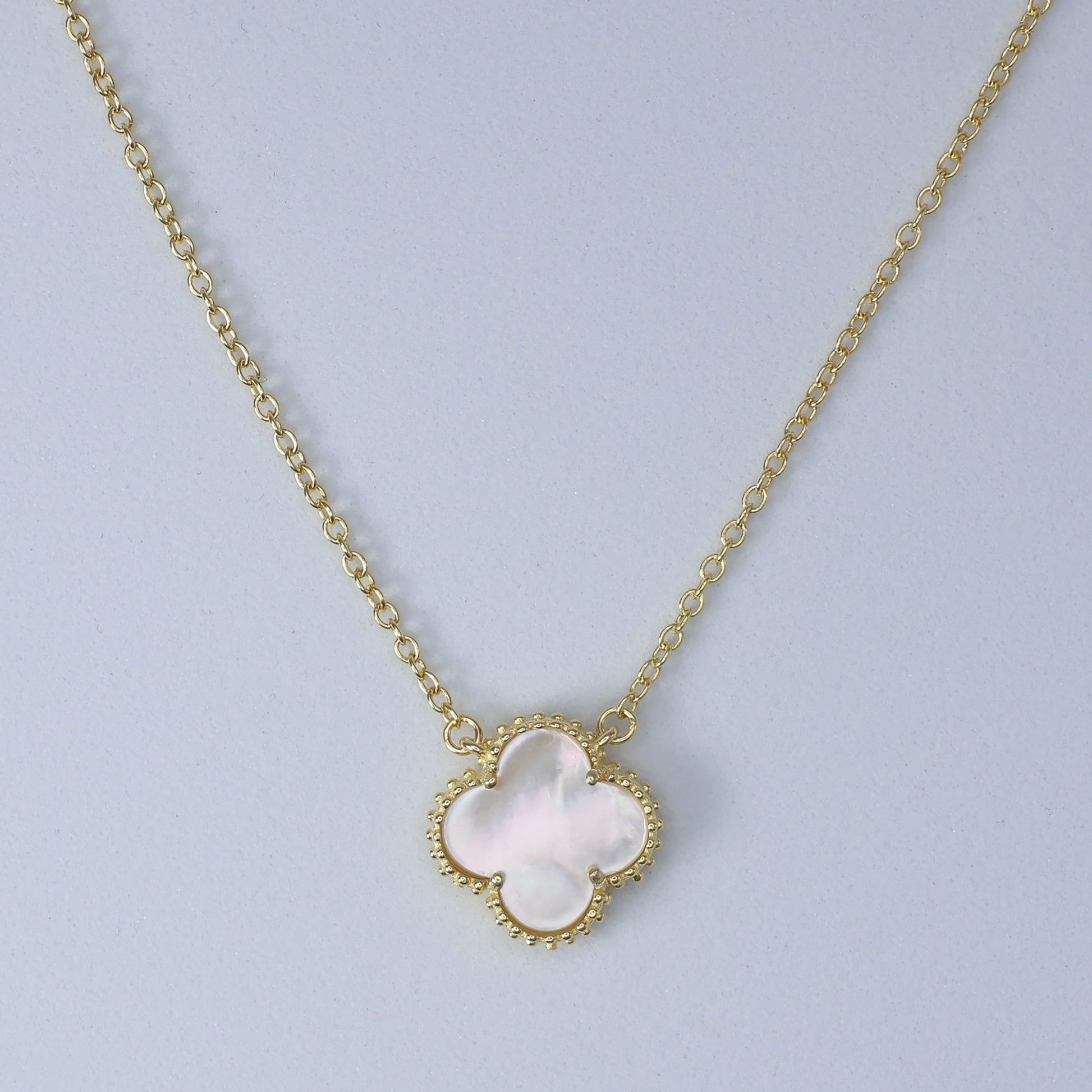 Elegant Mother of Pearl Clover Necklace with a delicate gold chain for stylish accessories