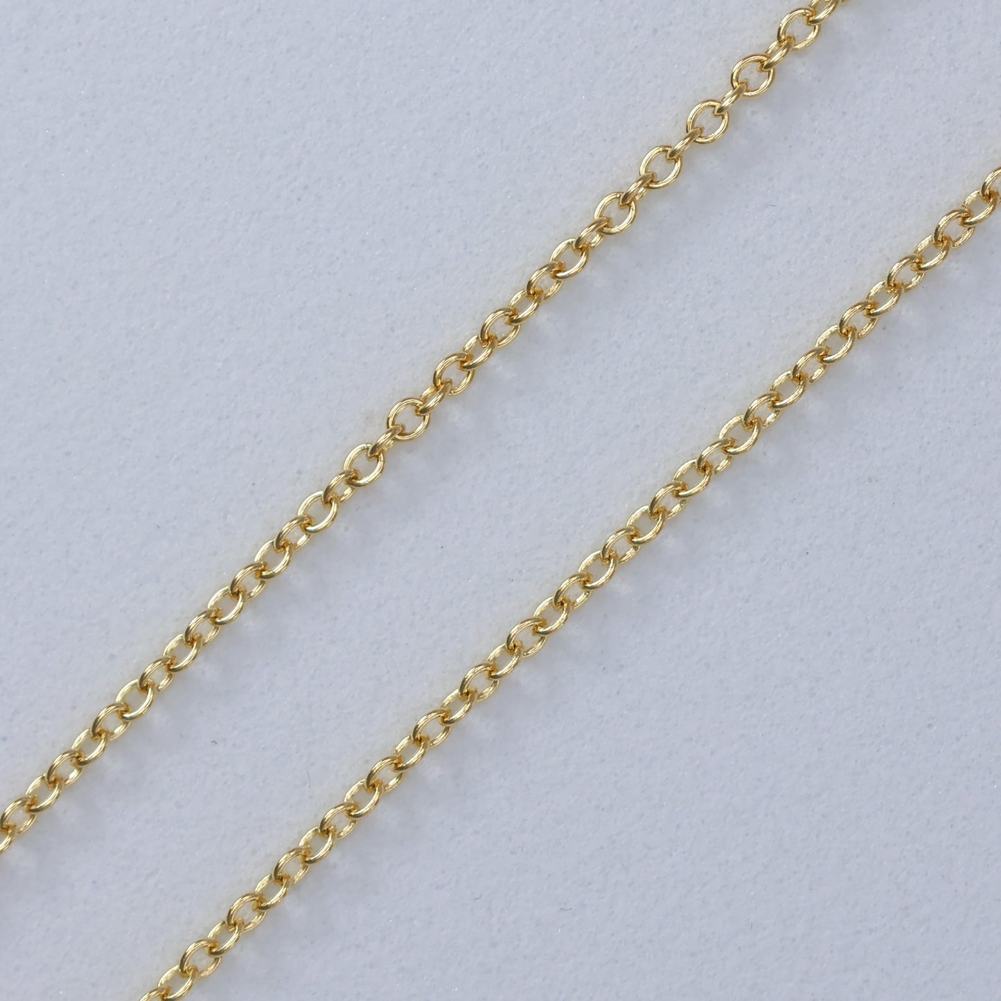 Close-up of a gold chain suitable for a Mother of Pearl Clover Necklace