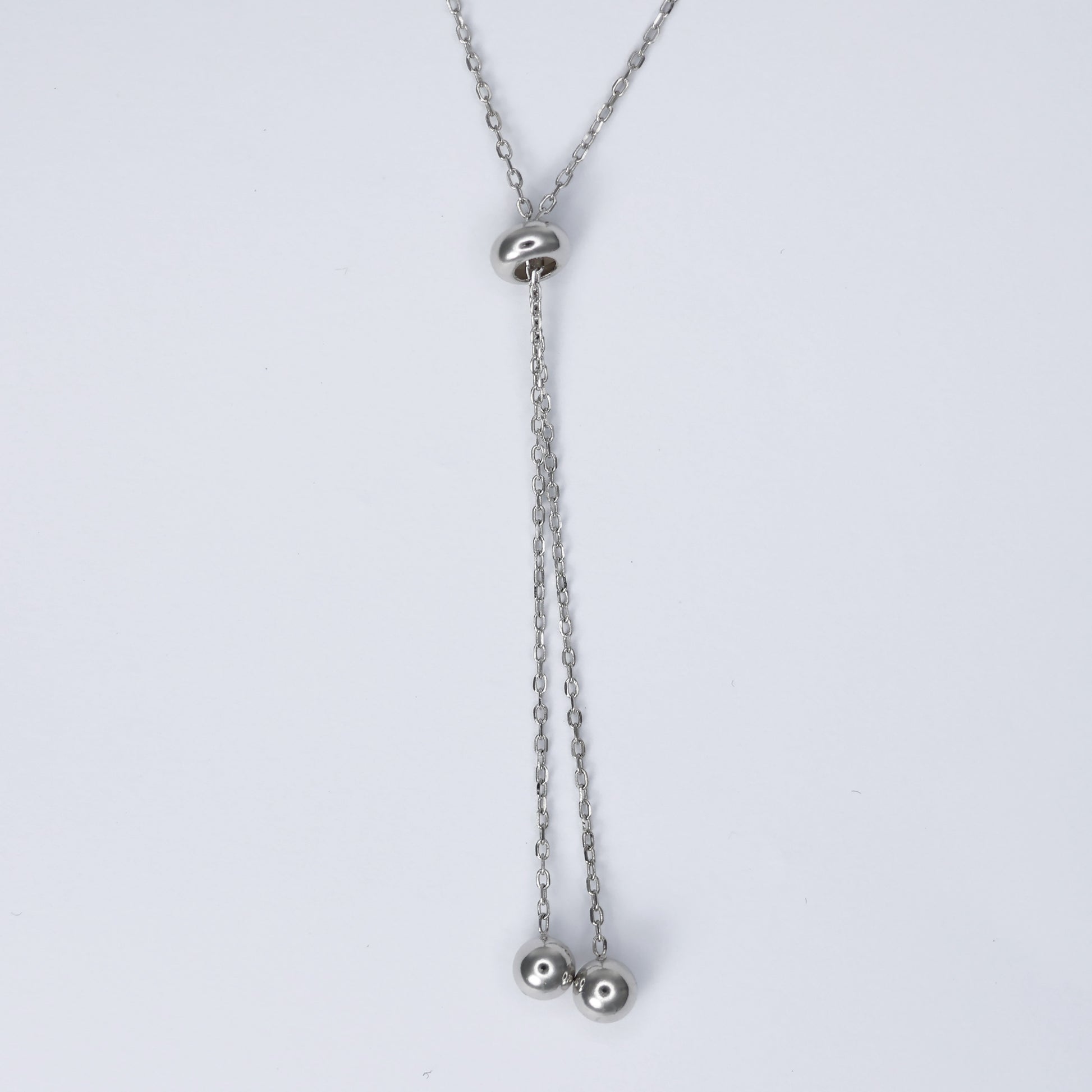 Elegant silver cross necklace for women featuring a delicate chain and stylish pendant design
