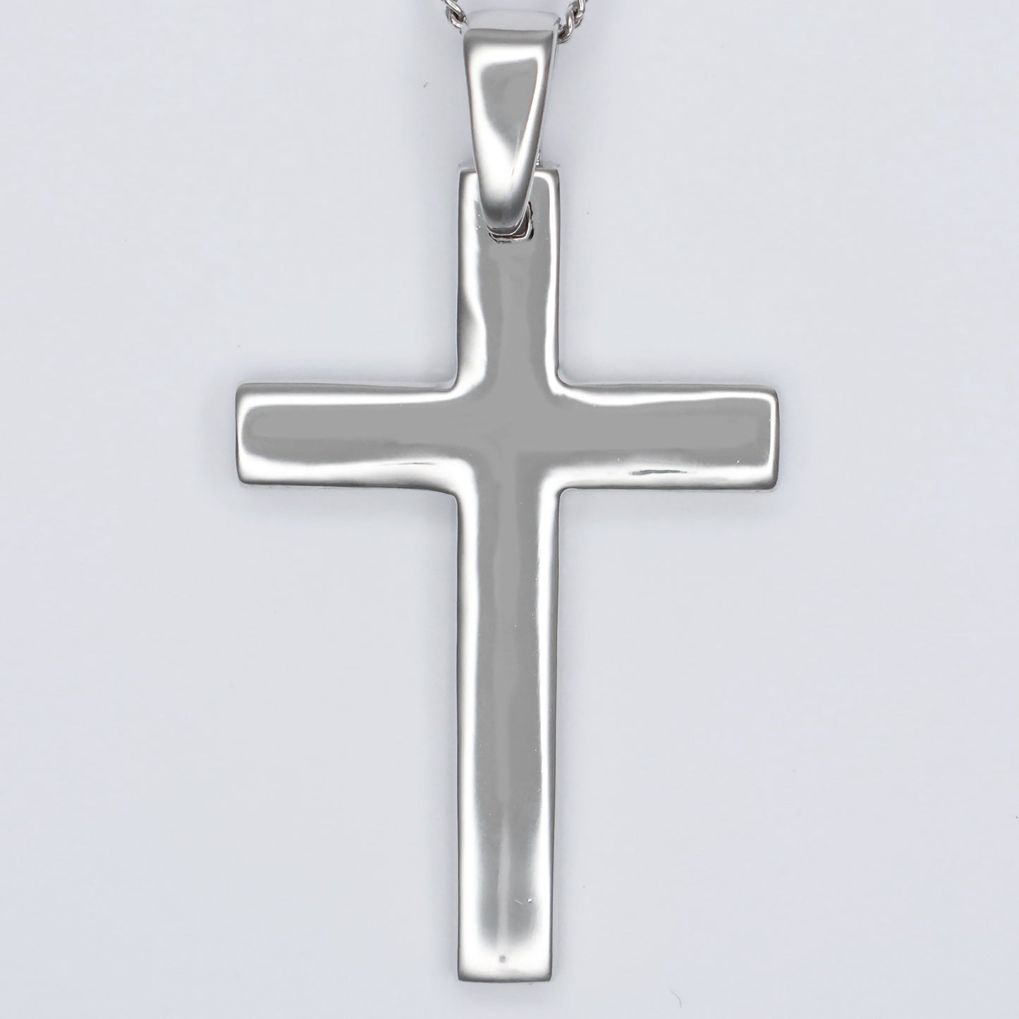 Stylish silver cross pendant necklace with a sleek and polished design for everyday wear