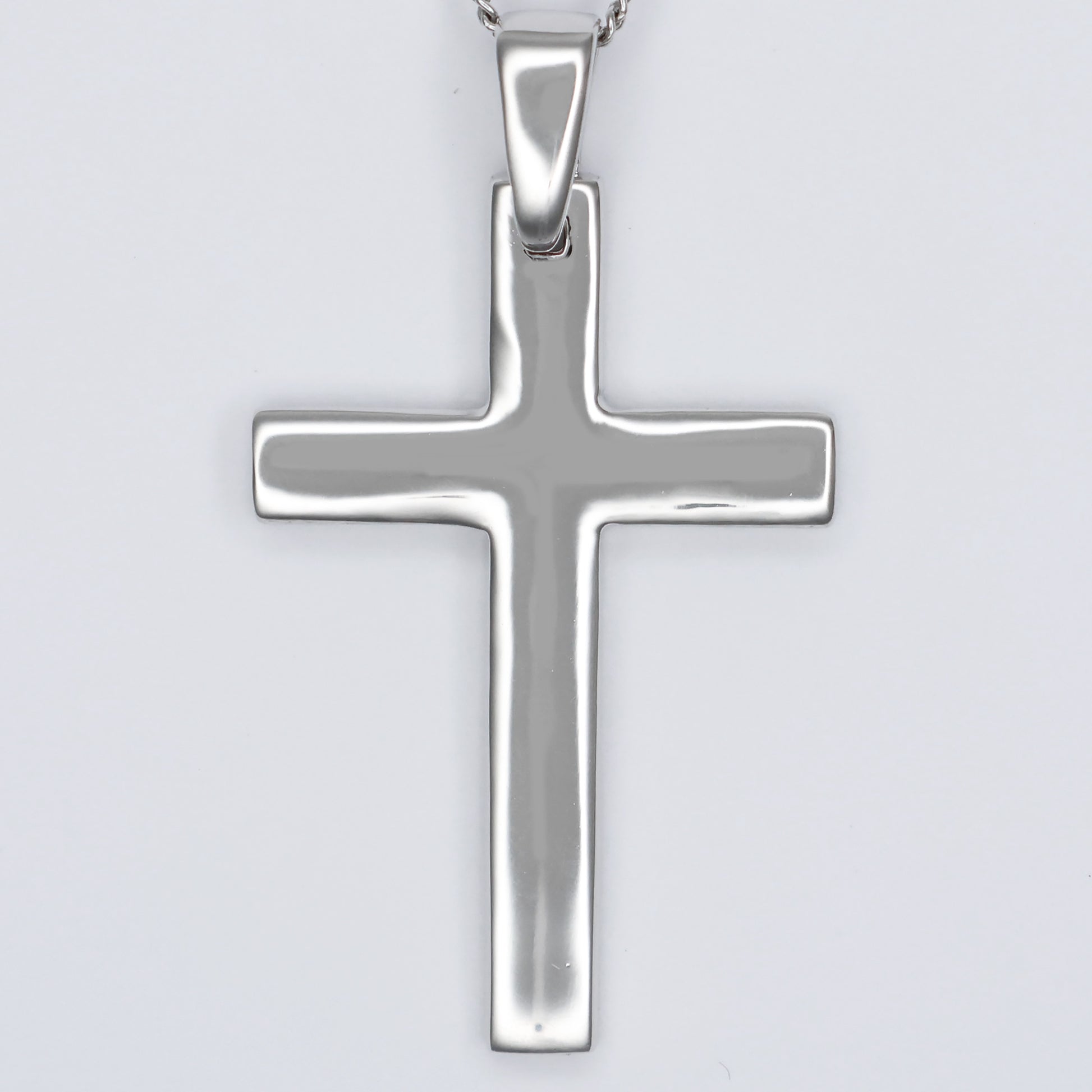 Stylish silver cross pendant necklace with a sleek and polished design for everyday wear