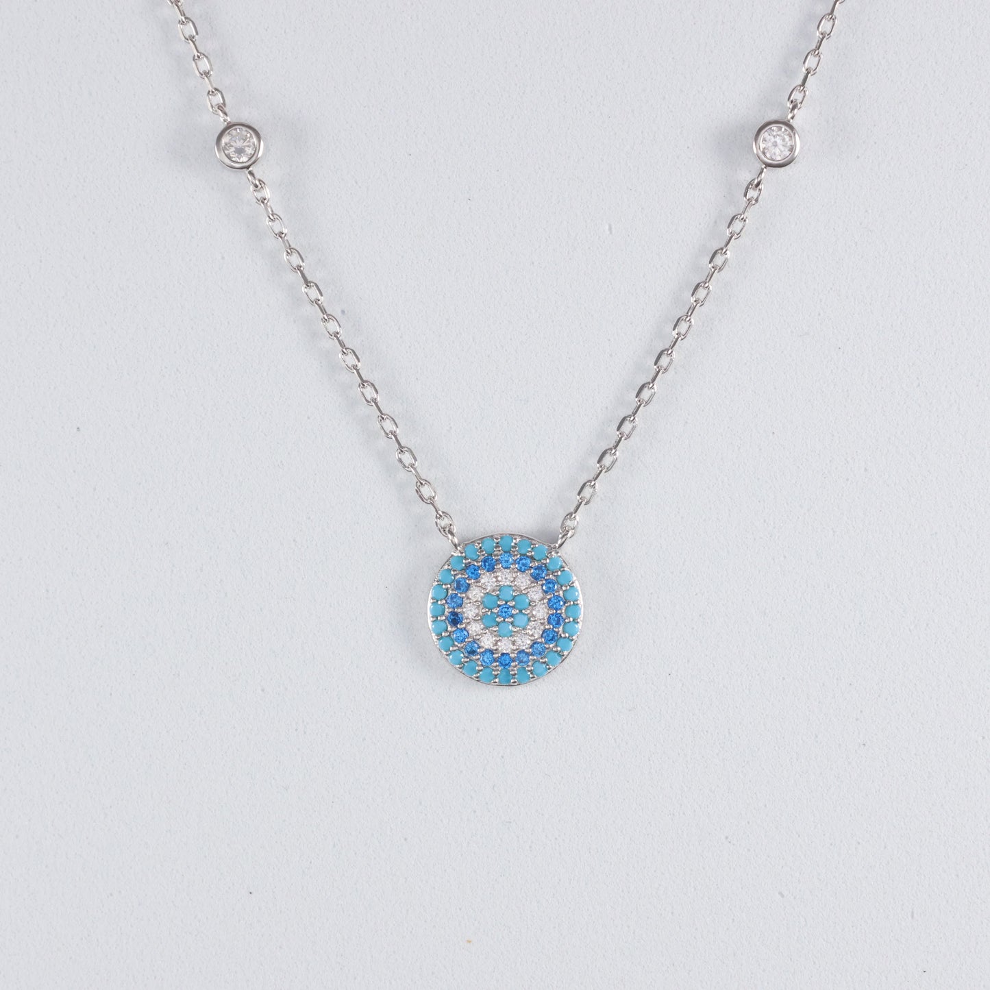 Silver Evil Eye Pendant with Turquoise and Clear Crystal Details on a Delicate Chain