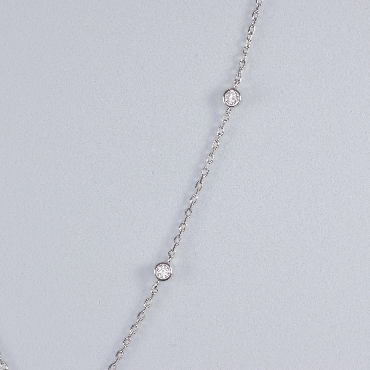 Silver Evil Eye Pendant with a delicate chain and sparkling accents for protection and style