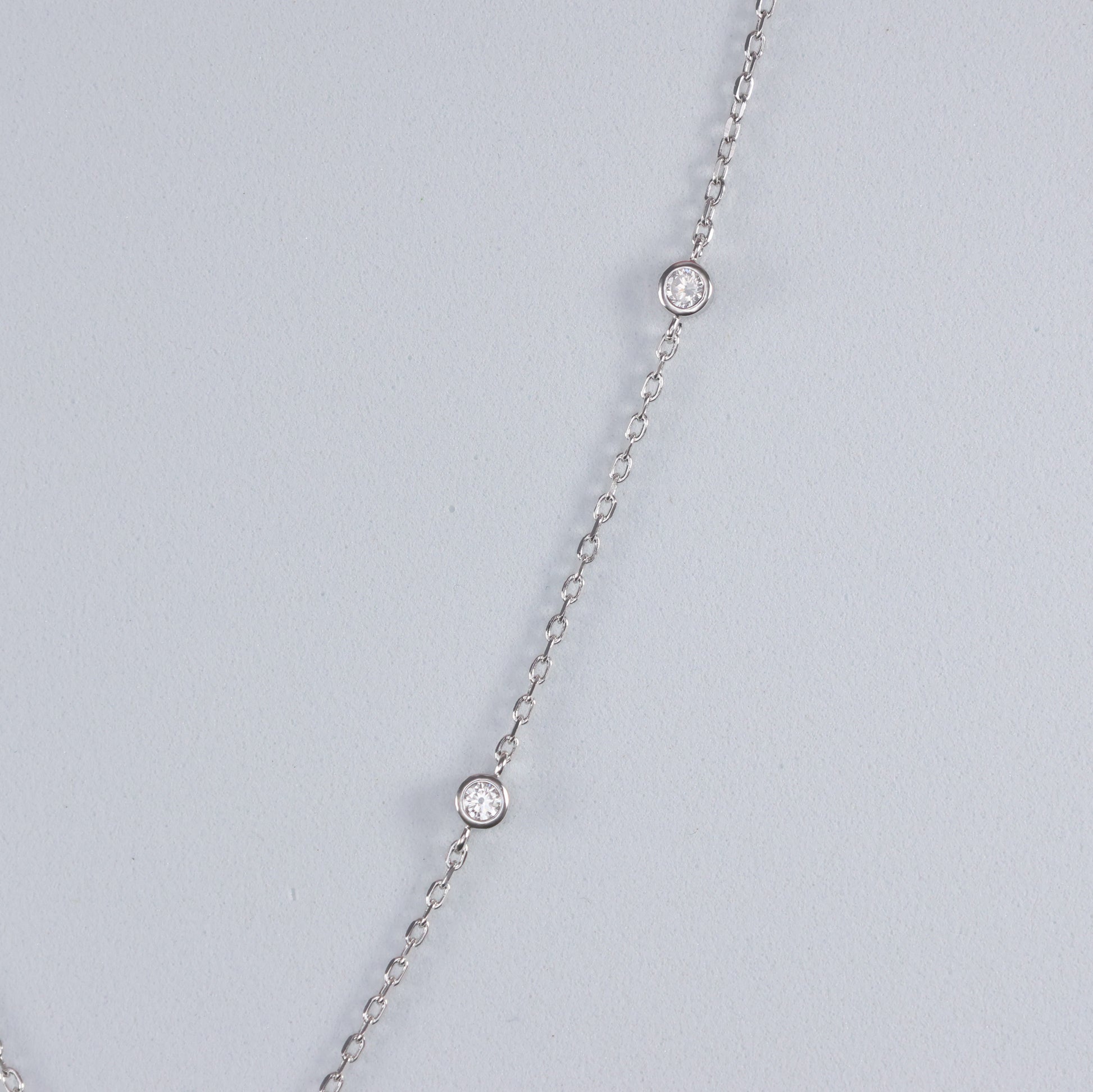 Silver Evil Eye Pendant with a delicate chain and sparkling accents for protection and style