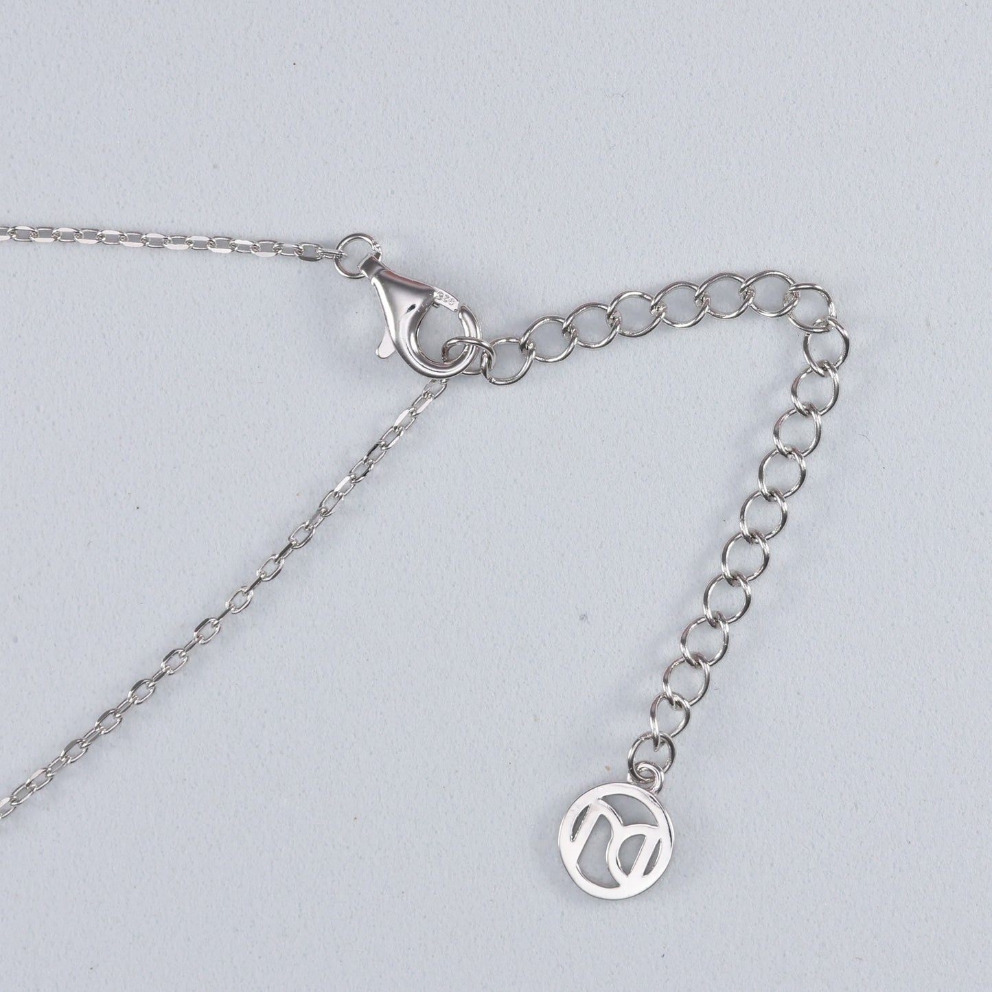 Adjustable Silver Evil Eye Pendant with delicate chain for a stylish look and protection
