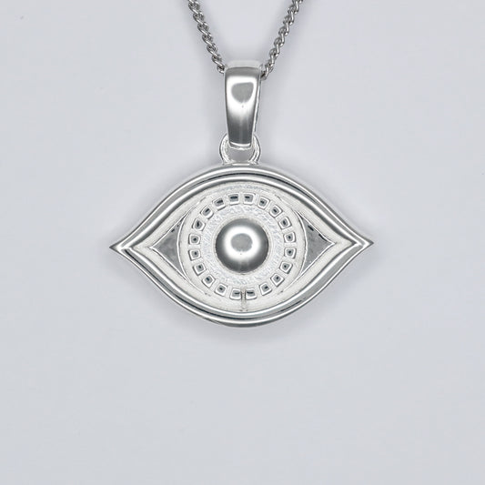 Elegant silver eye pendant necklace featuring intricate detailing and a polished finish
