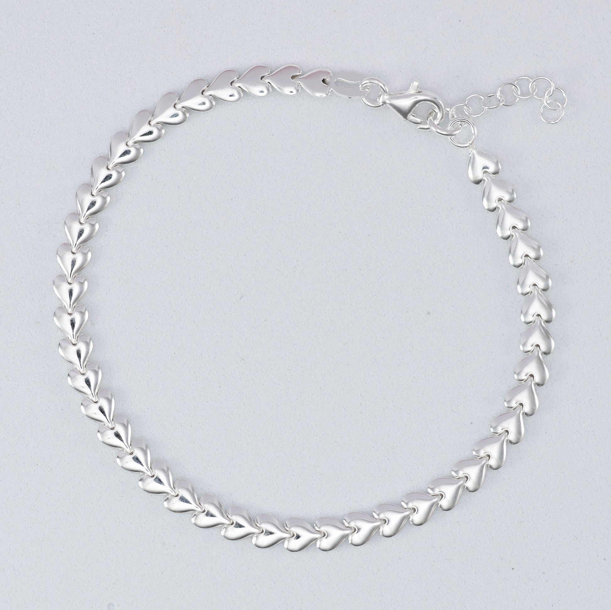 Elegant silver heart link bracelet featuring a stylish design for everyday wear