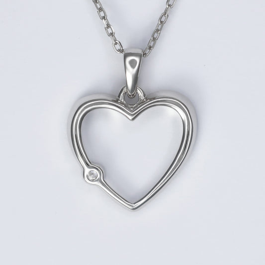 Stylish silver heart pendant for women with a sparkling gem detail on a delicate chain