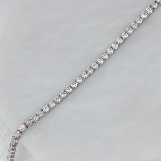 Elegant silver tennis bracelet featuring sparkling cubic zirconia stones for a timeless look